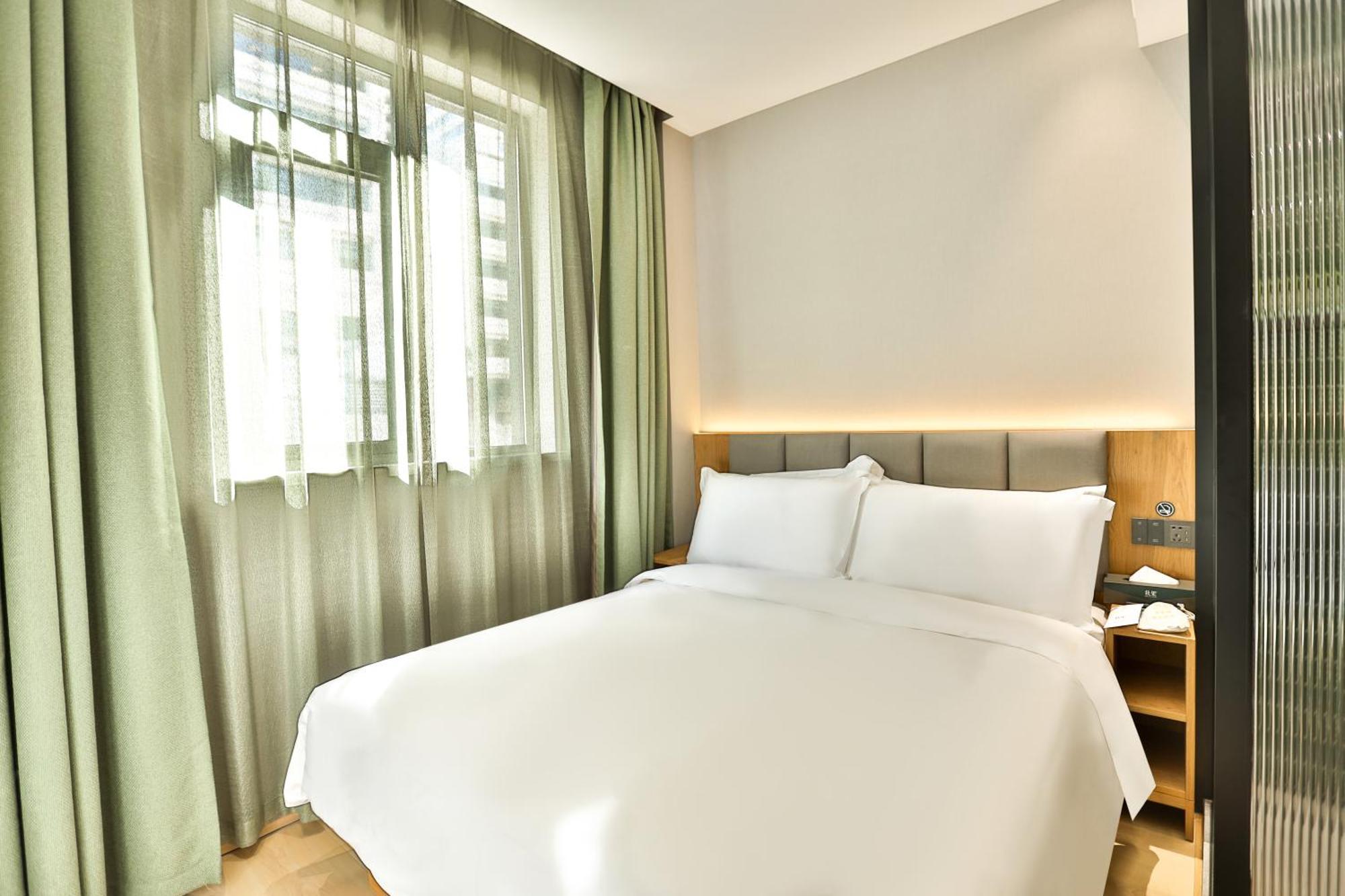 True Go Hotel - Shanghai Jing'An Temple Nanjing West Road Kültér fotó